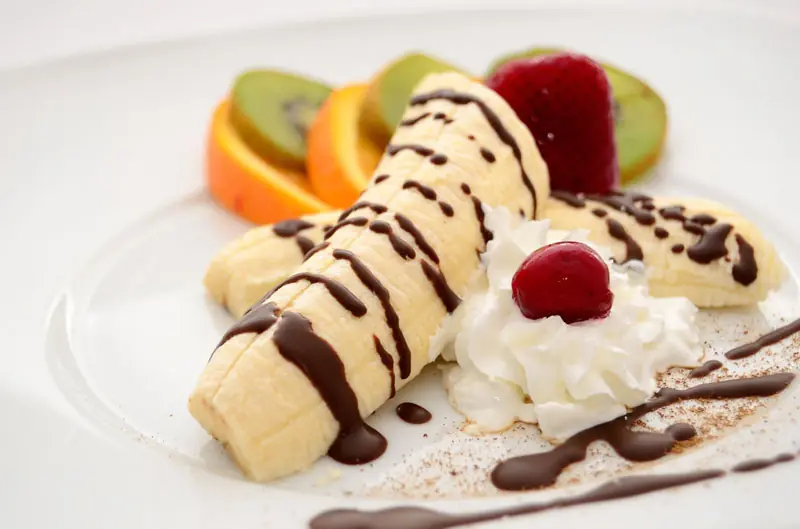 Crepe with banana, cream and chocolate