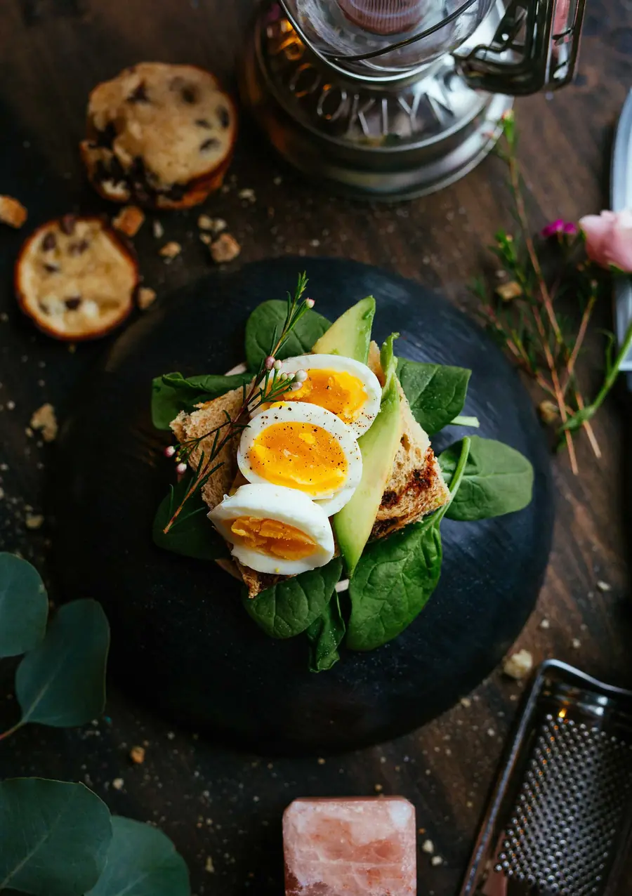 Soft eggs on greens with toast